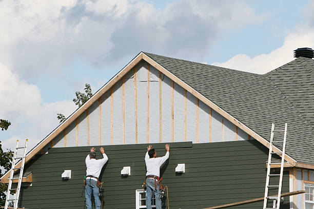 Professional Emergency Siding Repair technician working in Triadelphia, WV